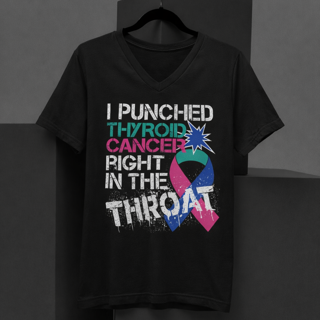 Black t-shirt with colorful text and graphic design on a dark background