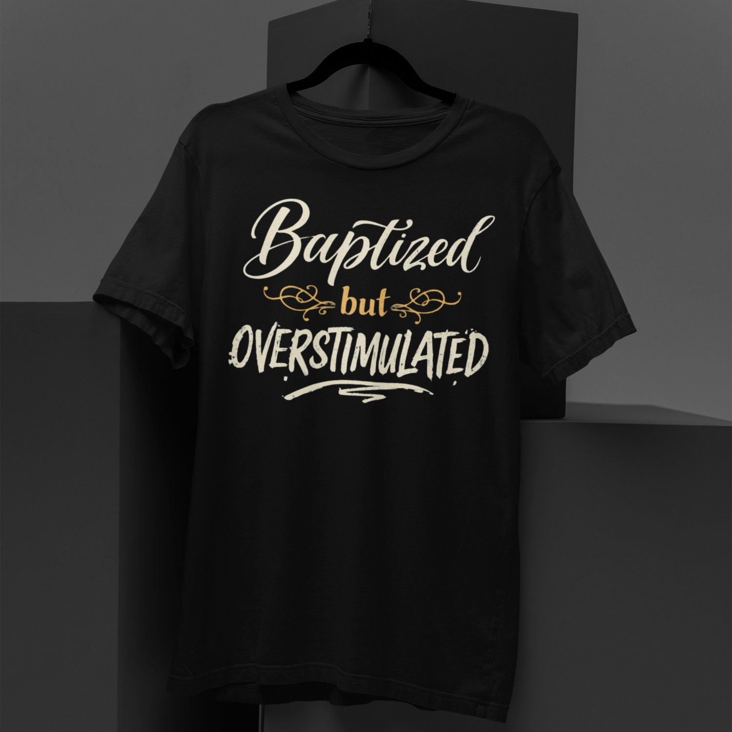 Black t-shirt with white and yellow text on a dark background